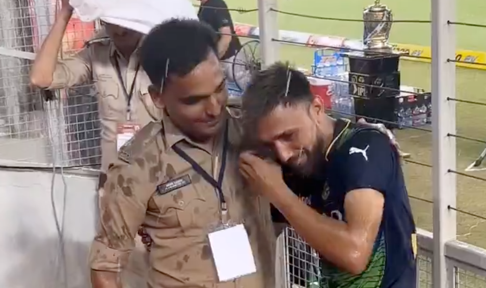 Policeman Comforts Sad RCB Fan After KKR Match Loss