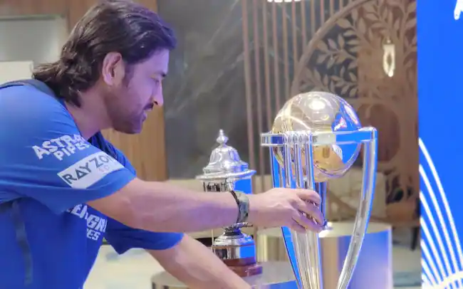 Dhoni Signs World Cup Winning Photo at BCCI Museum, Poses With ICC Trophies