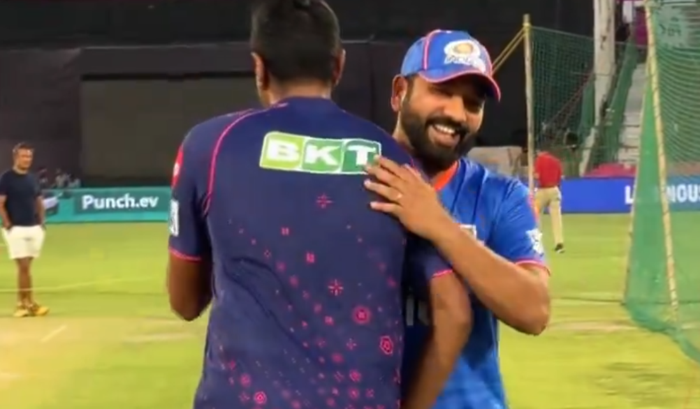 Rohit Sharma interacts happily with Rajasthan Royals players before IPL match