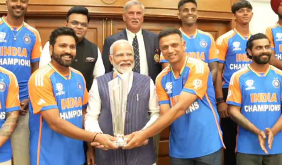 PM Modi Laughs with Rohit, Kohli, Dravid, and Poses with India's T20 World Cup Champions