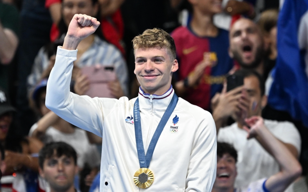 France's Marchand wins Olympic gold in 400m medley with record time