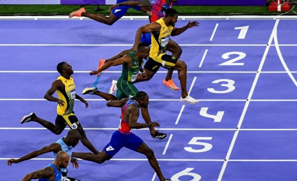 Noah Lyles Clinches Olympic Gold in 100m Photo Finish; Kishane Thompson Takes Silver and Fred Kerley Wins Bronze
