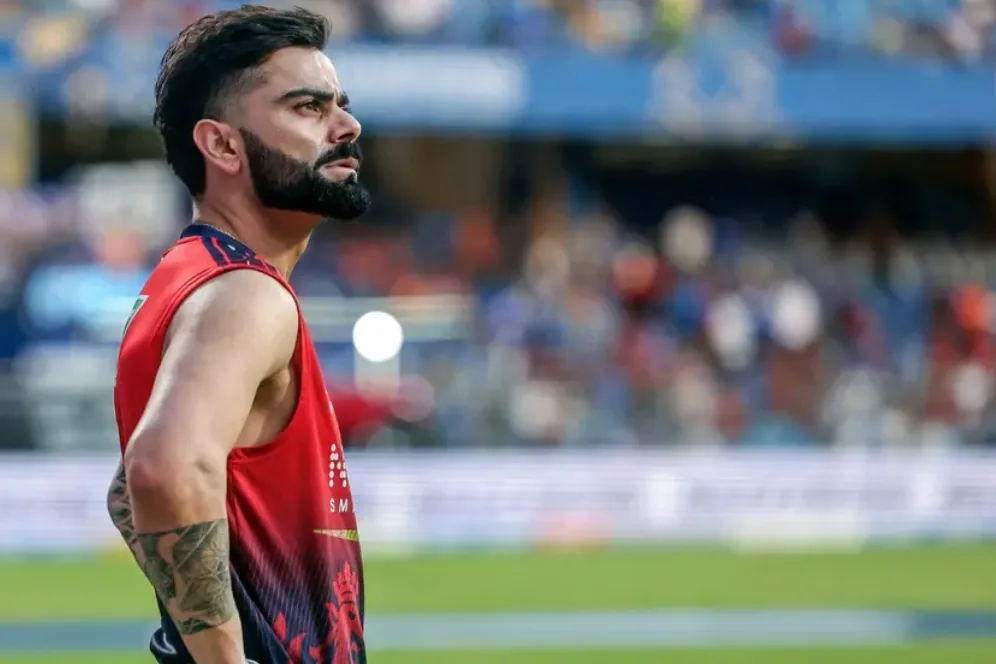 Rohit injured, Kohli plays through pain as RCB beat MI