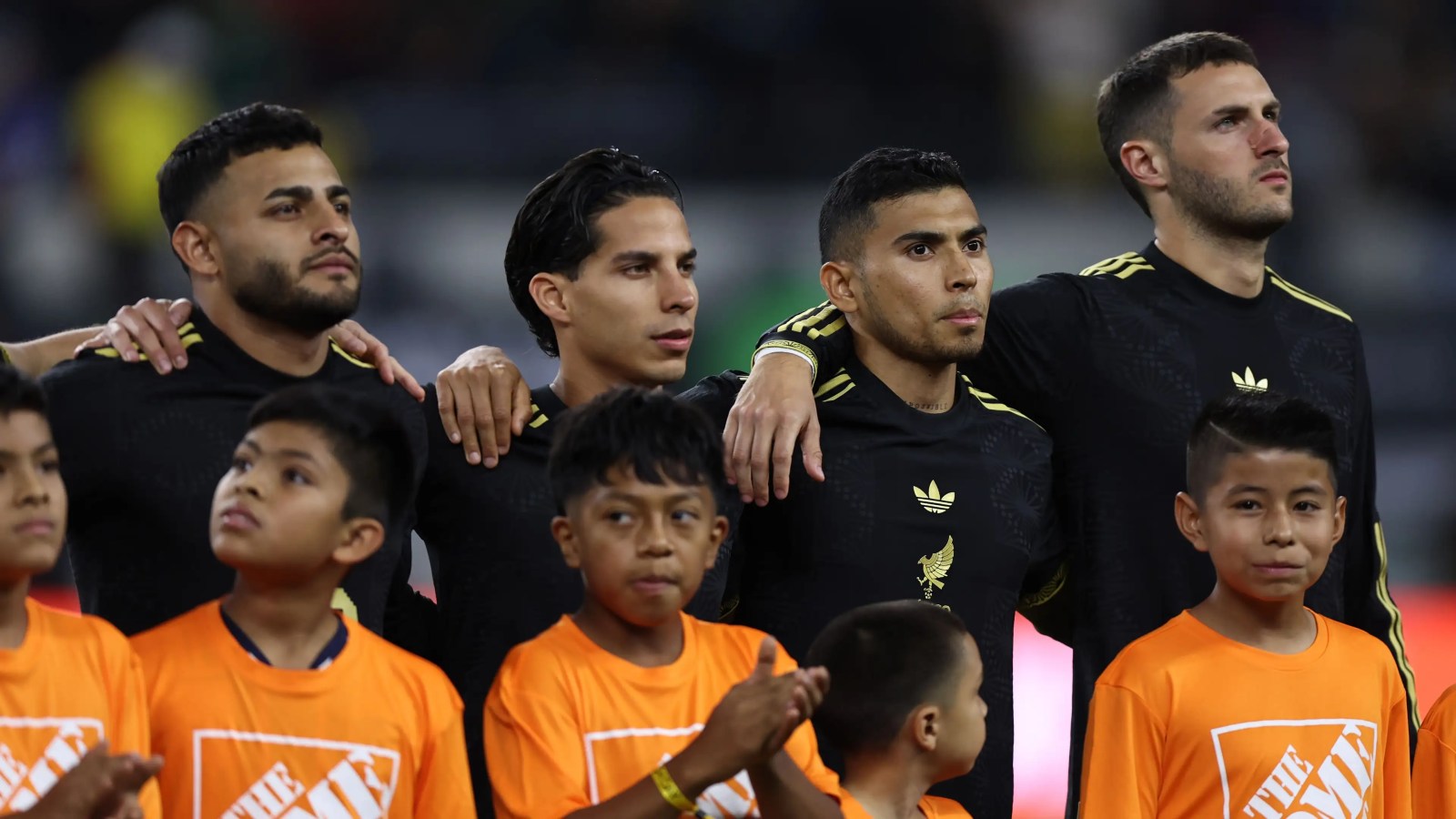 Mexico players celebrate reaching the World Cup 2026 round of 16 before facing England