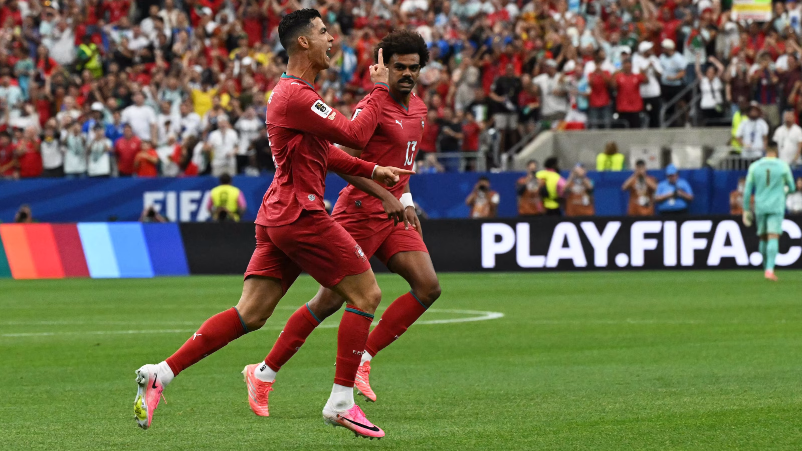 Cristiano Ronaldo celebrating Portugal goal after setting the record for scoring in six FIFA World Cups